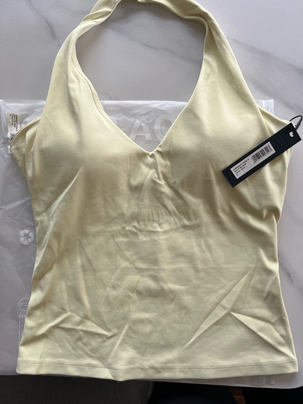 Sleek Halter Tank Top in Pale Yellow - Picture 2 of 2